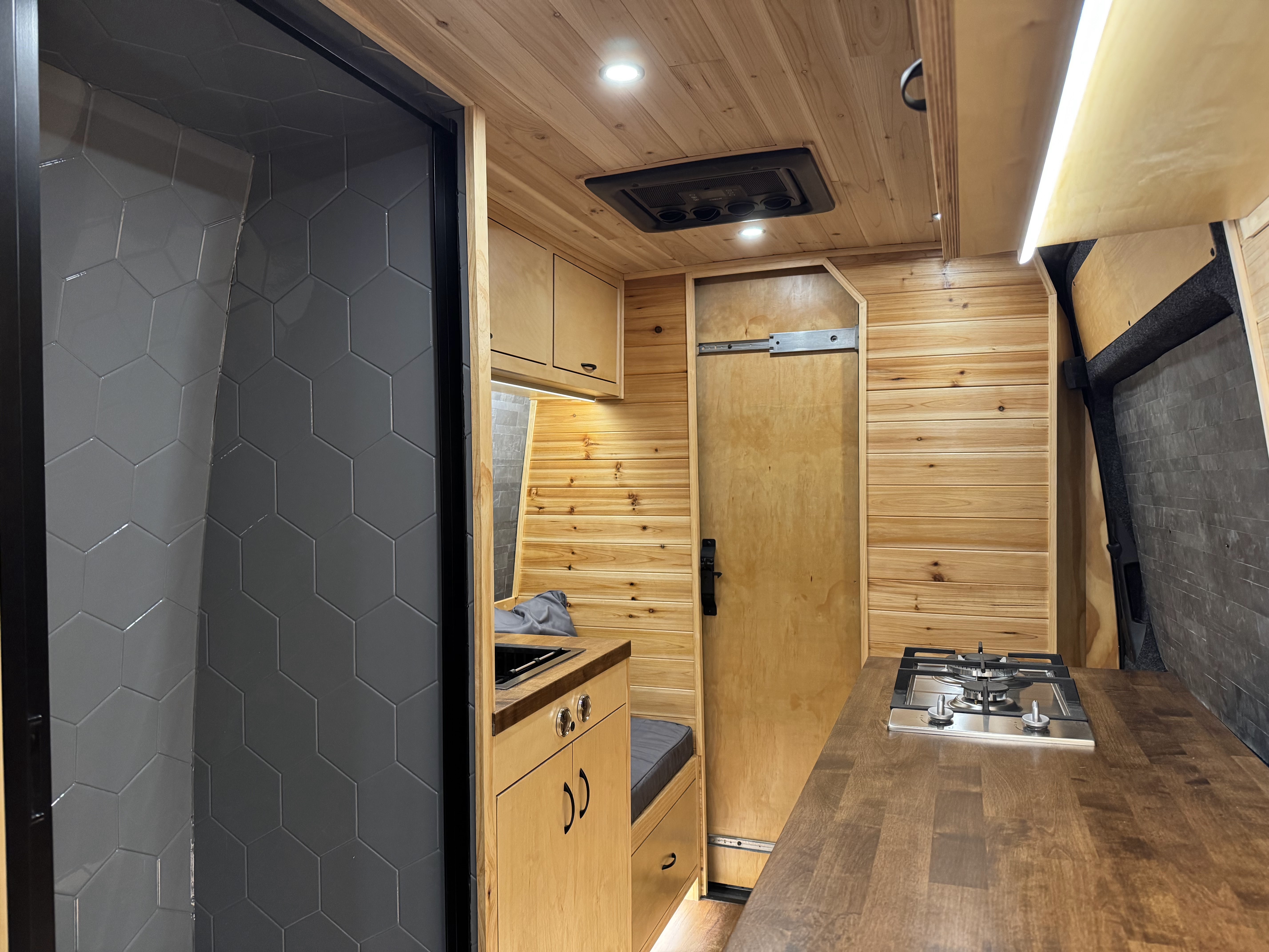 Van kitchen looking toward the bathroom door